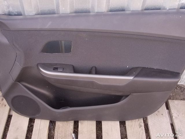 Обшивка двери Киа Рио