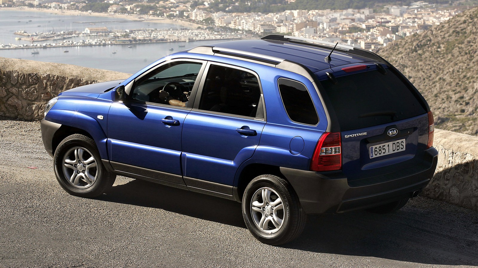 Киа Спортейдж 2 поколения